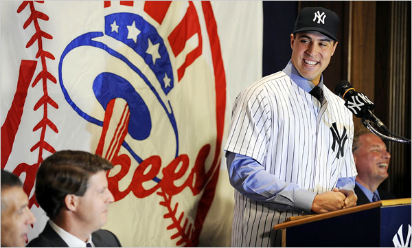Tex takes the podium at the press conference (New York Times)